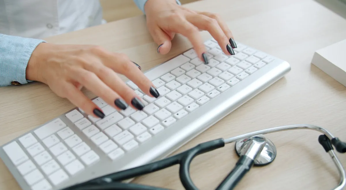 Hospice billing staff cross-checking revenue codes against level of care documentation
